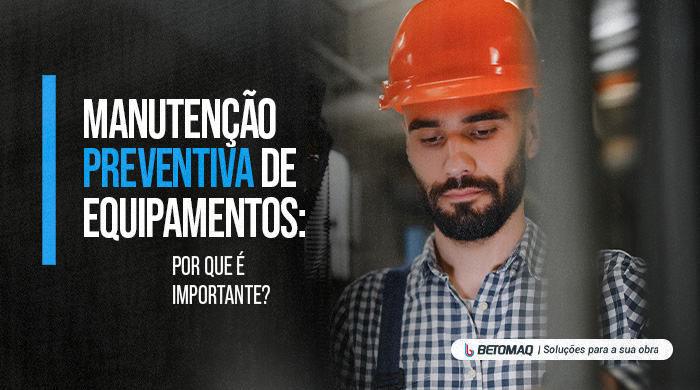 Técnico utilizando capacete de segurança e uniforme de trabalho enquanto realiza inspeção ou manutenção em equipamento industrial.